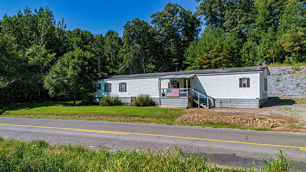 33.1 Acres of Recreational Land with Home for Sale in Cadiz, Kentucky