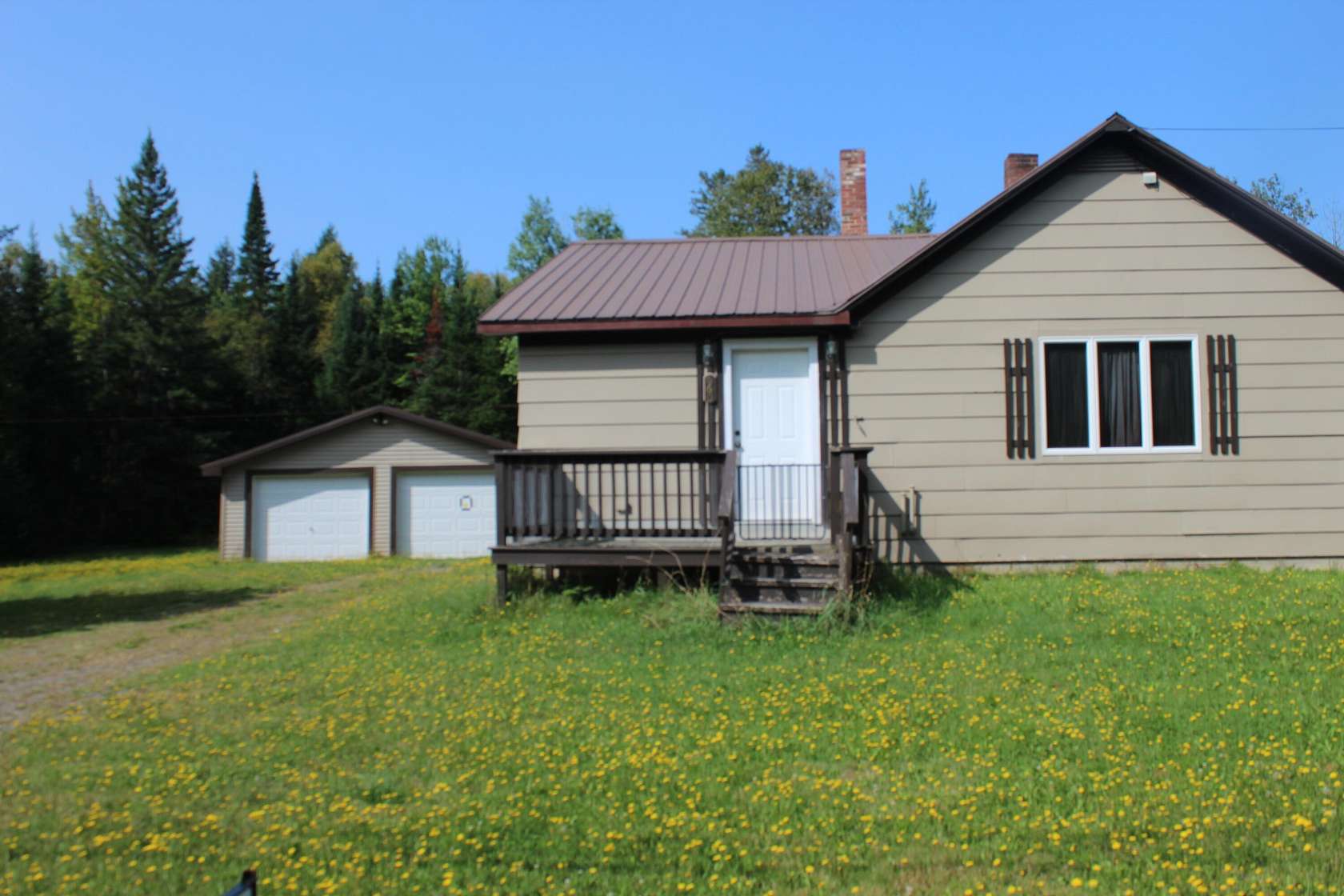 1.5 Acres of Land with Home for Sale in Stacyville, Maine