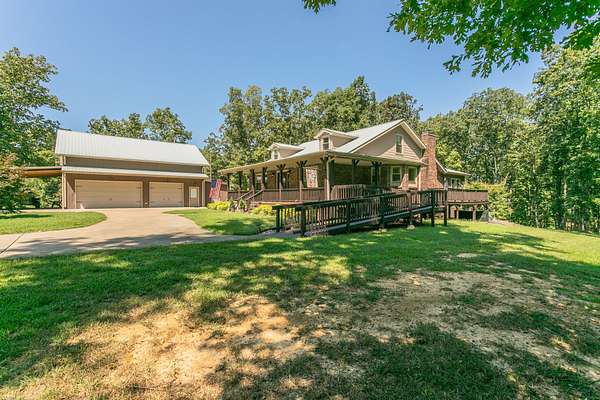 5.1 Acres of Land with Home for Sale in Centerville, Tennessee