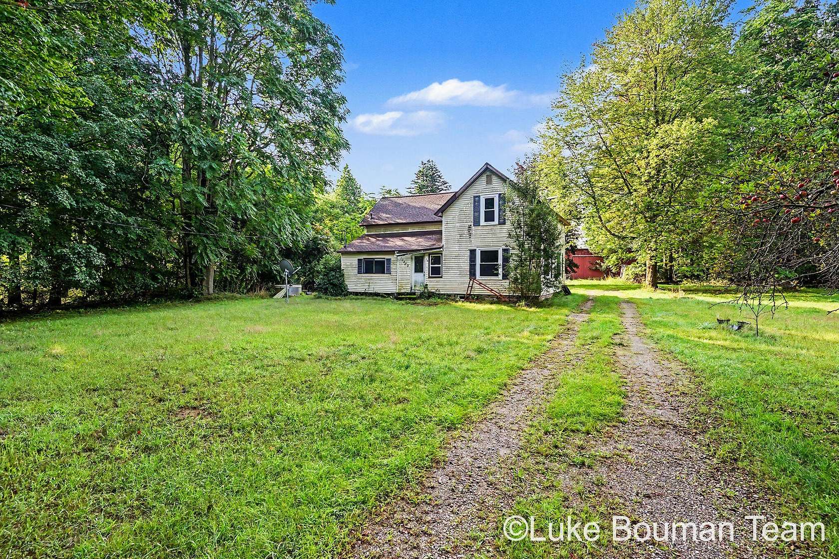 6.79 Acres of Land with Home for Sale in Fruitport, Michigan