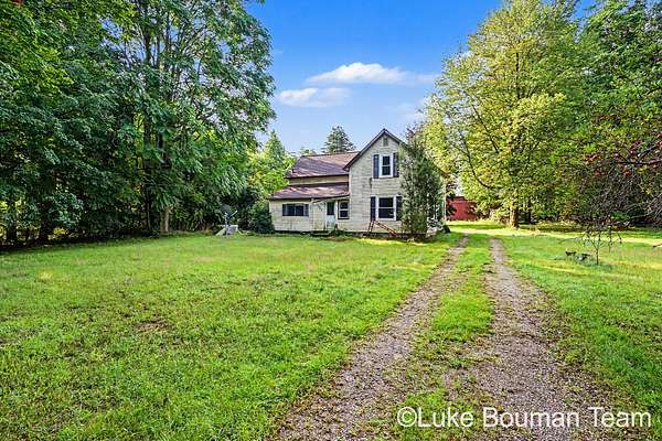 6.79 Acres of Land with Home for Sale in Fruitport, Michigan