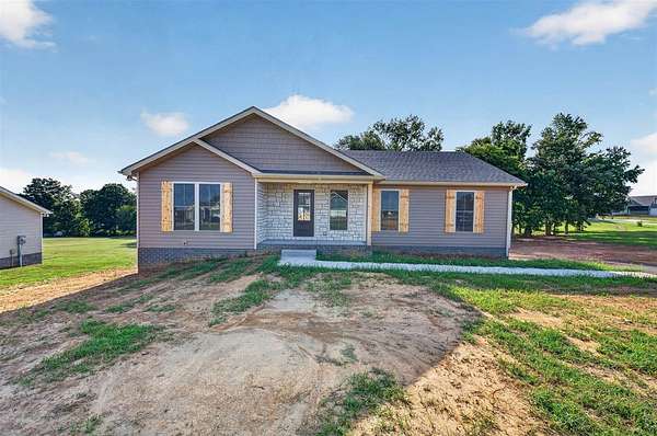 1.64 Acres of Land with Home for Sale in Smiths Grove, Kentucky