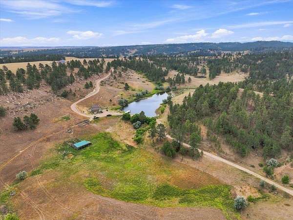 250 Acres of Agricultural Land with Home for Sale in Belle Fourche, South Dakota