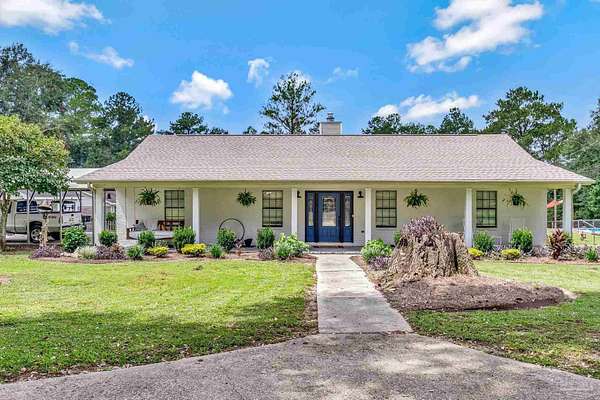 3.6 Acres of Land with Home for Sale in Cantonment, Florida