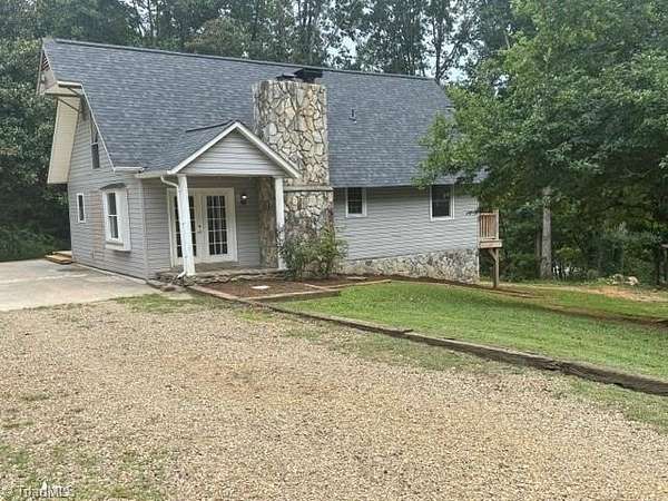 5.19 Acres of Land with Home for Sale in Millers Creek, North Carolina