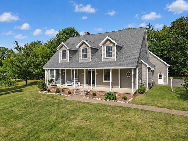 5.12 Acres of Land with Home for Sale in Hampden, Maine