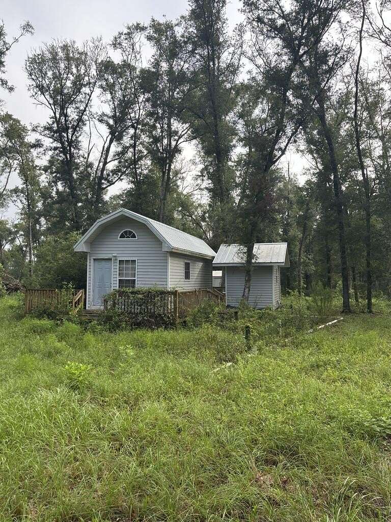 4.83 Acres of Land with Home for Sale in Old Town, Florida