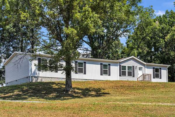 5.18 Acres of Land with Home for Sale in Castalian Springs, Tennessee