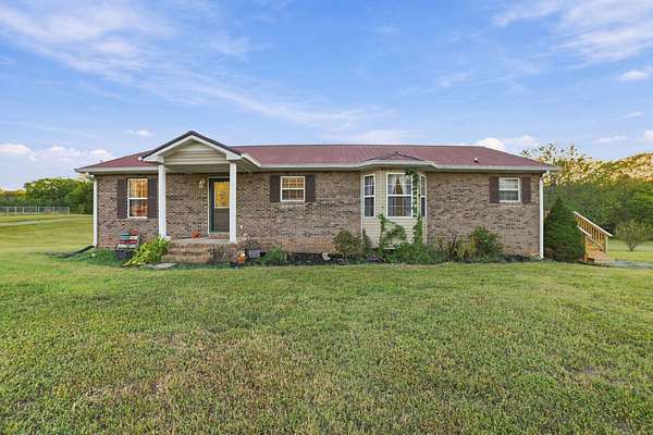 1.63 Acres of Land with Home for Sale in Cedar Hill, Tennessee