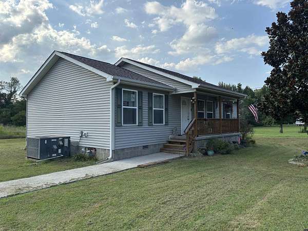 6 Acres of Land with Home for Sale in Arlington, Kentucky