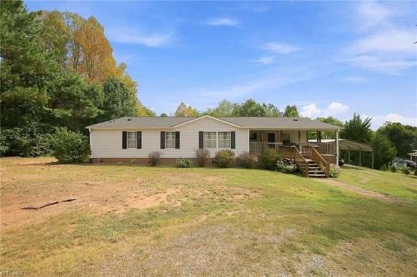5 Acres of Land with Home for Sale in Walnut Cove, North Carolina