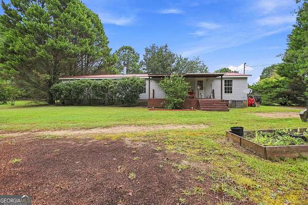 7.38 Acres of Land with Home for Sale in Gay, Georgia