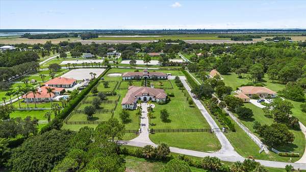 5 Acres of Land with Home for Sale in Loxahatchee Groves, Florida