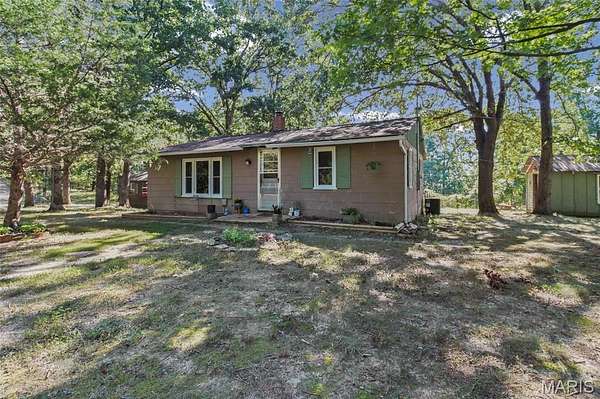 10.9 Acres of Recreational Land with Home for Sale in Sullivan, Missouri