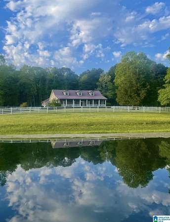 6.7 Acres of Land with Home for Sale in Pell City, Alabama