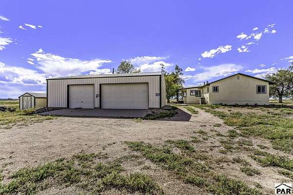 39.1 Acres of Land with Home for Sale in Avondale, Colorado