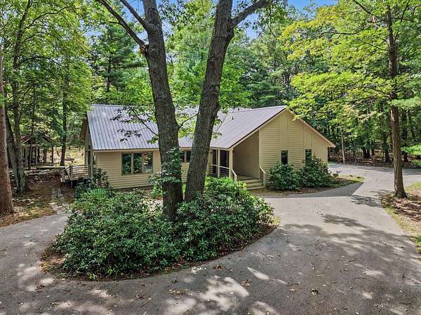 4.3 Acres of Land with Home for Sale in Norton Shores, Michigan