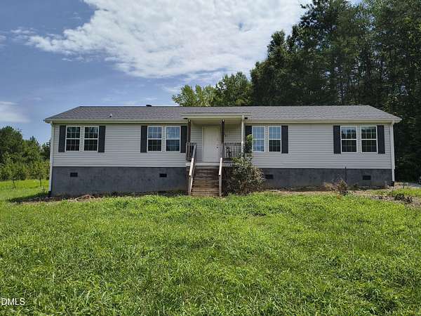 6.32 Acres of Land with Home for Sale in Timberlake, North Carolina
