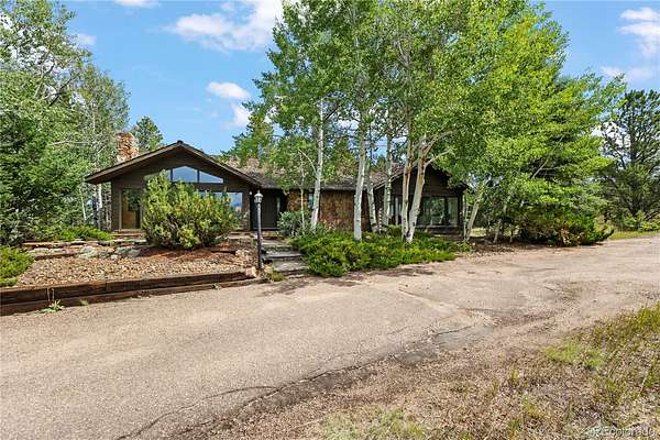 117 Acres of Land with Home for Sale in Woodland Park, Colorado