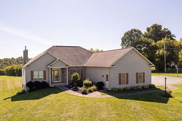 3.84 Acres of Land with Home for Sale in New Woodstock, New York