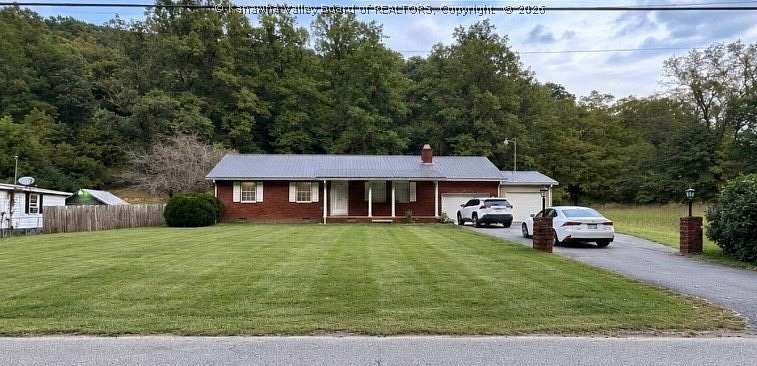 1.5 Acres of Land with Home for Sale in Pecks Mill, West Virginia