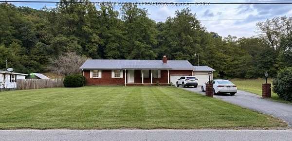 1.5 Acres of Land with Home for Sale in Pecks Mill, West Virginia