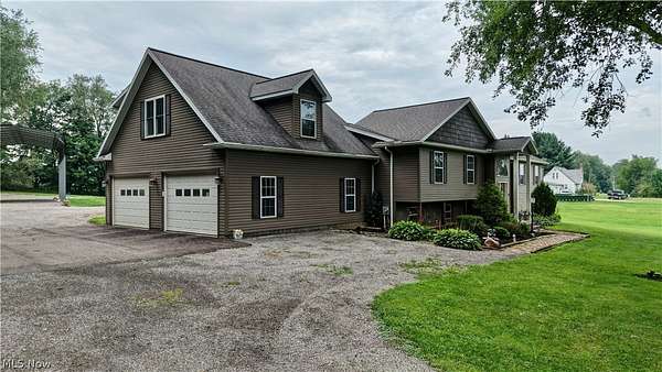 8.17 Acres of Land with Home for Auction in Beach City, Ohio
