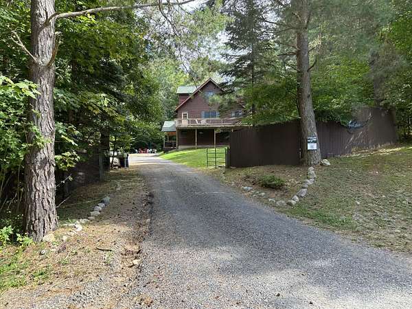 1.58 Acres of Land with Home for Sale in Tupper Lake, New York