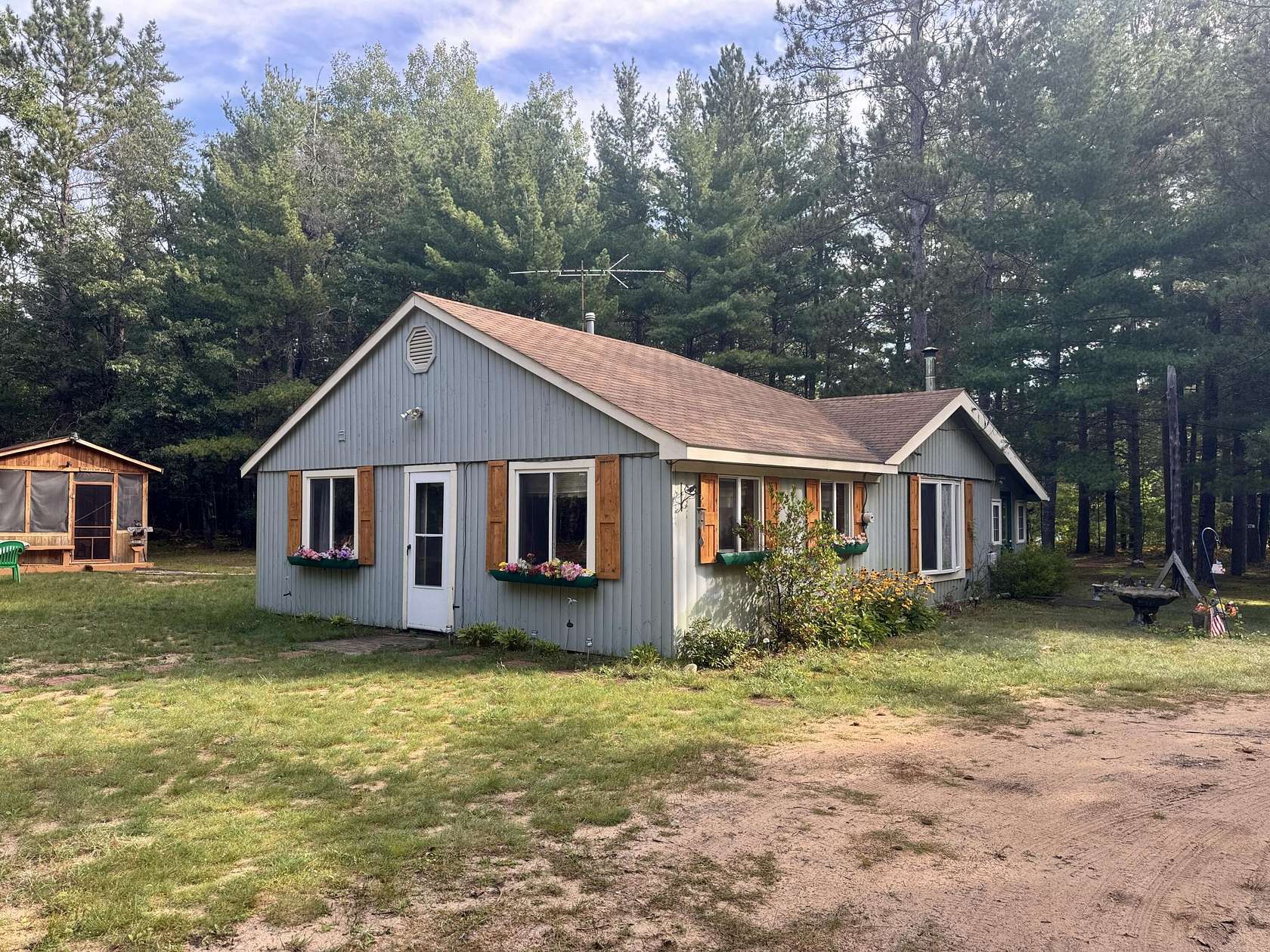 8 Acres of Land with Home for Sale in Luzerne, Michigan