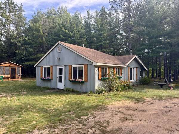 8 Acres of Land with Home for Sale in Luzerne, Michigan