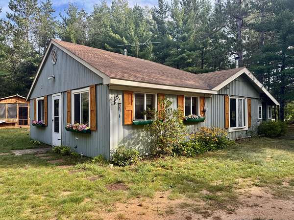 8 Acres of Land with Home for Sale in Luzerne, Michigan