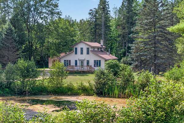 76 Acres of Recreational Land with Home for Sale in Tustin, Michigan