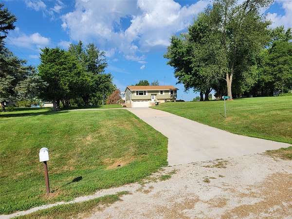 5.2 Acres of Land with Home for Sale in Carlisle, Iowa