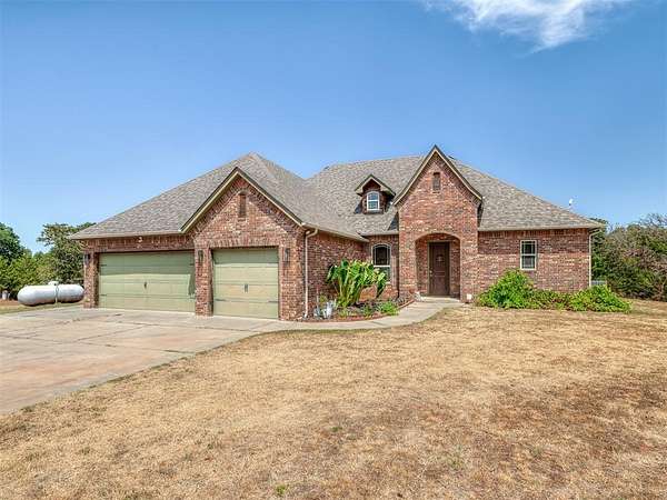 3 Acres of Land with Home for Sale in Harrah, Oklahoma