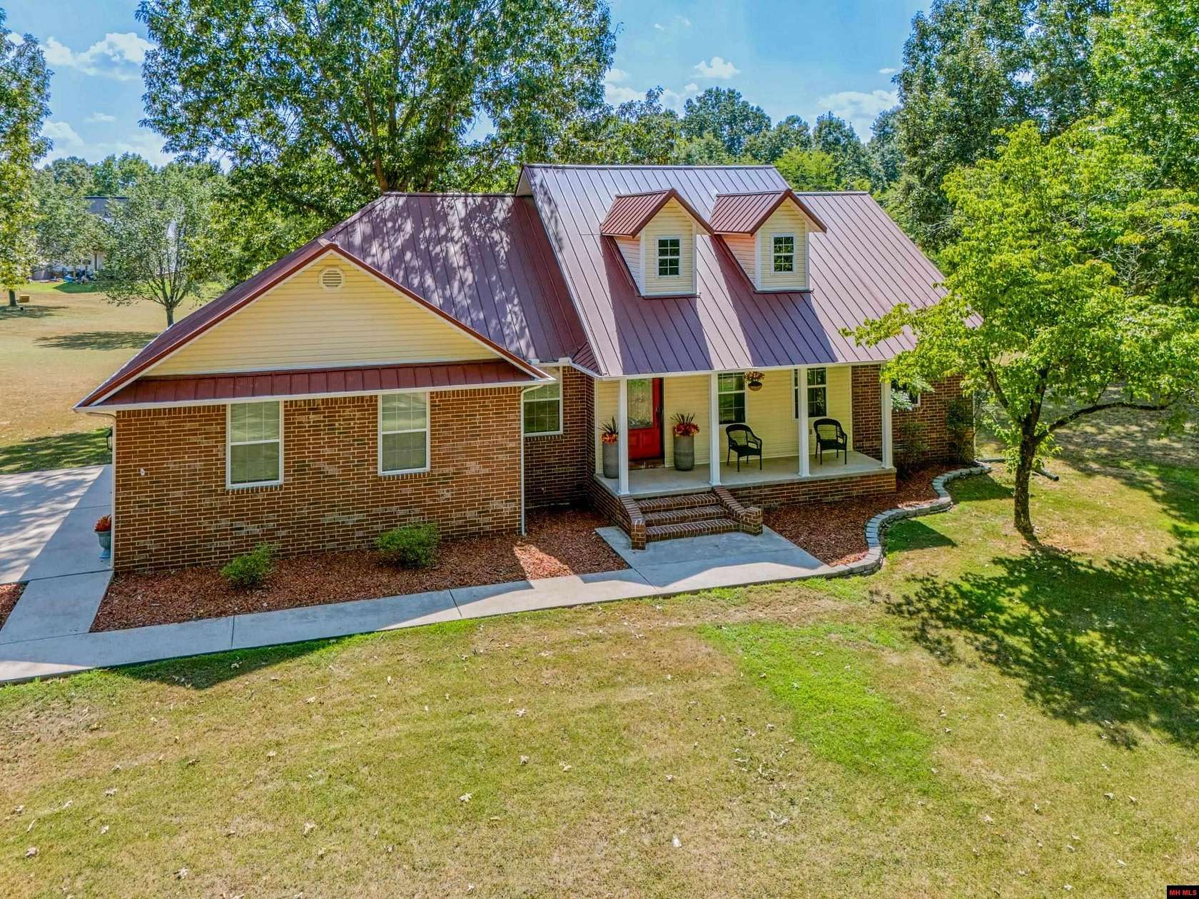 1.58 Acres of Land with Home for Sale in Flippin, Arkansas