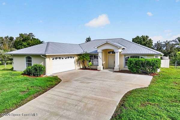 2.5 Acres of Land with Home for Sale in Grant, Florida