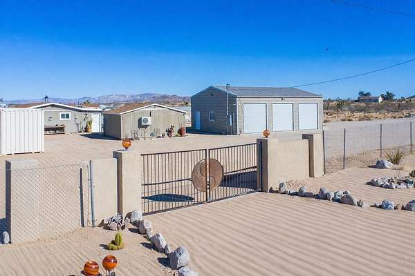4.7 Acres of Land with Home for Lease in Landers, California