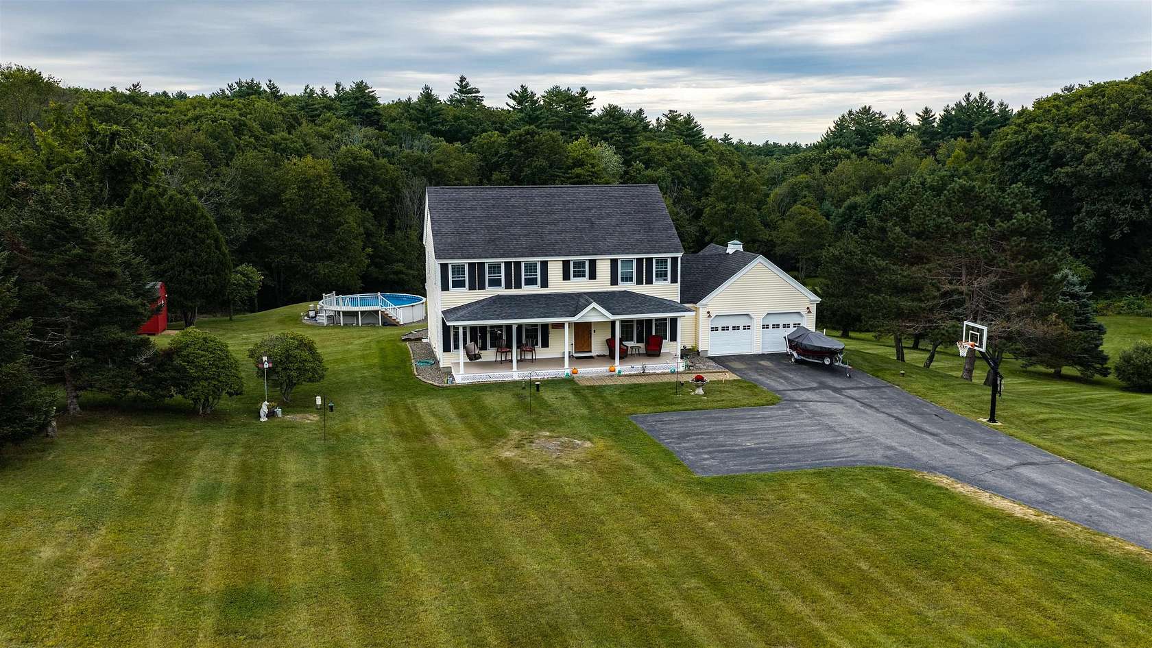 5 Acres of Land with Home for Sale in Raymond, New Hampshire