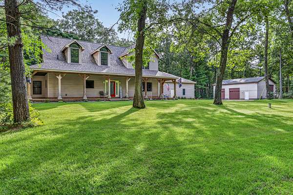 5 Acres of Land with Home for Sale in Twin Lake, Michigan