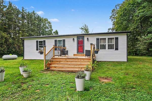 2.12 Acres of Land with Home for Sale in Marcellus, Michigan