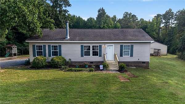 5.7 Acres of Land with Home for Sale in Asheboro, North Carolina