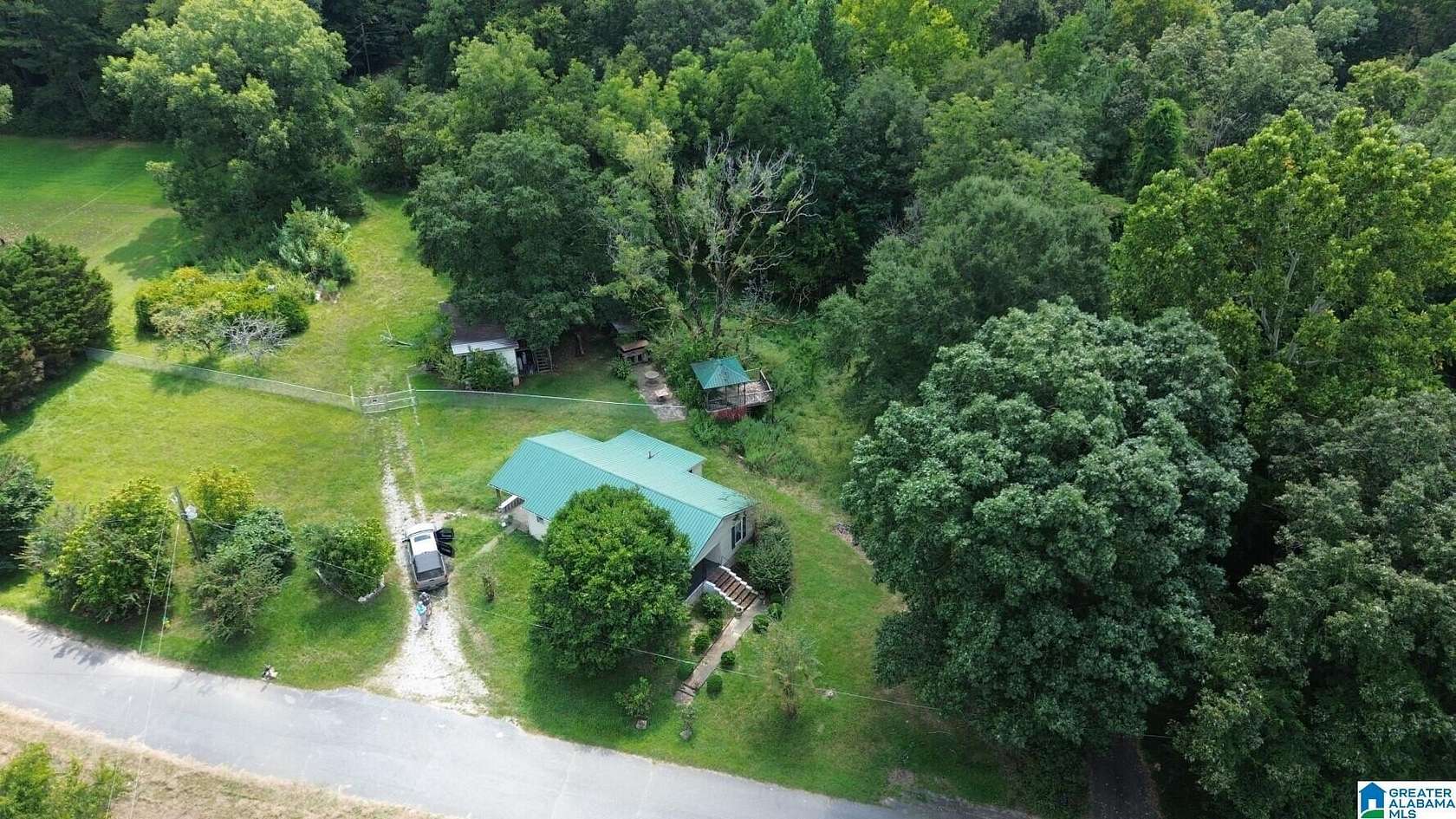 32 Acres of Recreational Land with Home for Sale in Leeds, Alabama