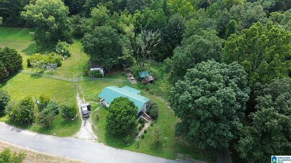 32 Acres of Recreational Land with Home for Sale in Leeds, Alabama