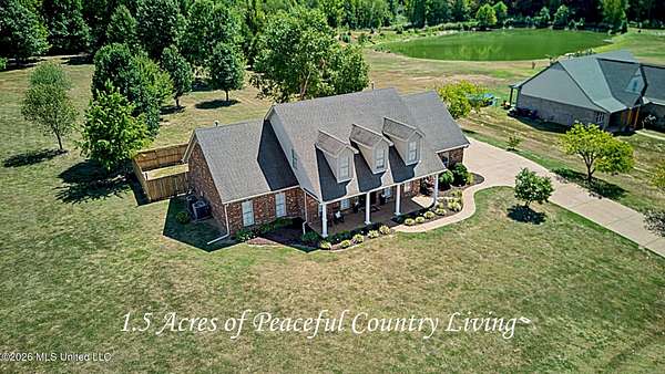 1.5 Acres of Land with Home for Sale in Nesbit, Mississippi