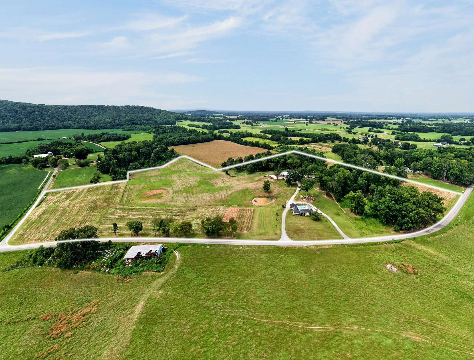 33.5 Acres of Land with Home for Auction in McMinnville, Tennessee