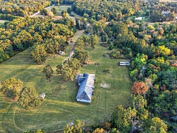 38.9 Acres of Recreational Land with Home for Sale in Tunas, Missouri