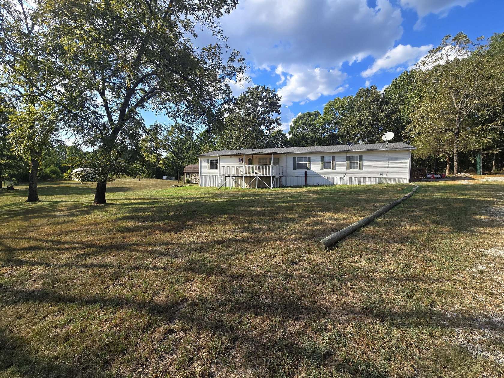 28 Acres of Land with Home for Sale in Peace Valley, Missouri
