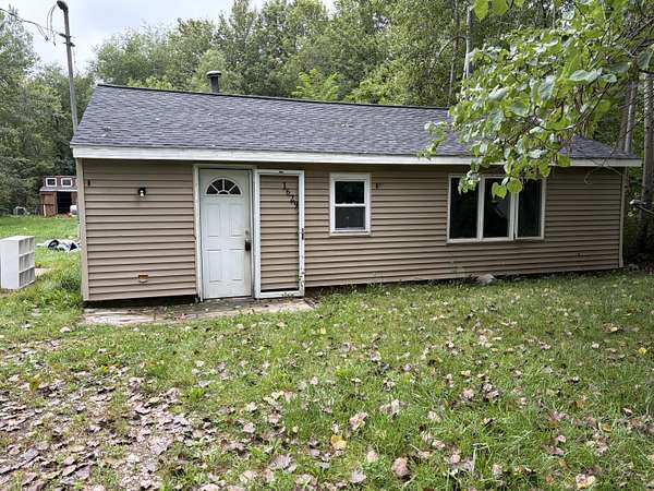 3 Acres of Land with Home for Sale in Coopersville, Michigan