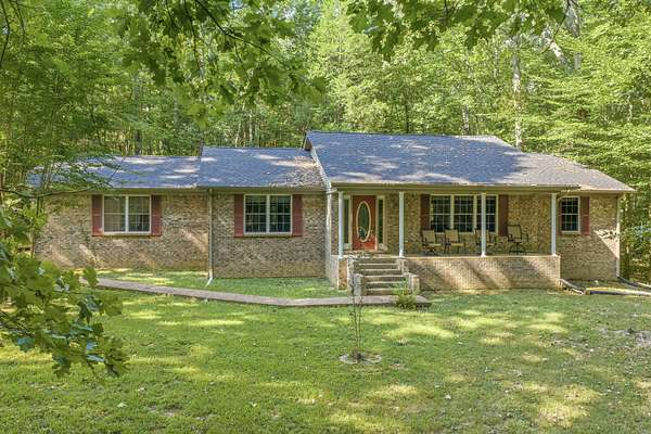 14.3 Acres of Land with Home for Sale in Springville, Tennessee