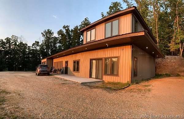 40 Acres of Recreational Land with Home for Sale in Camdenton, Missouri